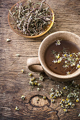 Image showing tea brewed with chamomile in ceramic mugs