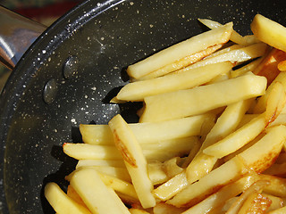 Image showing Potato chips in a frying pan