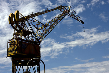 Image showing street lamp clouds and crane