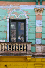 Image showing venetian blind and a red blue pink wall