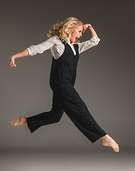 Image showing Beauty blond woman in ballet jump