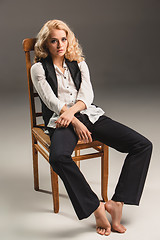 Image showing Beauty blond woman on chair