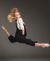 Image showing Beauty blond woman in ballet jump