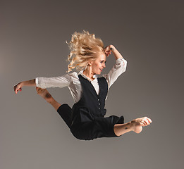 Image showing Beauty blond woman in ballet jump