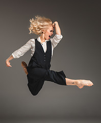 Image showing Beauty blond woman in ballet jump