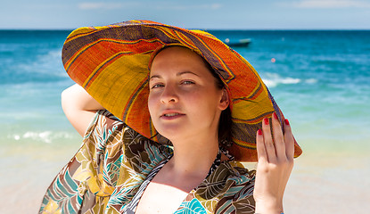 Image showing woman in hat on the beach
