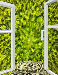 Image showing window opened to green abstraction and dollars