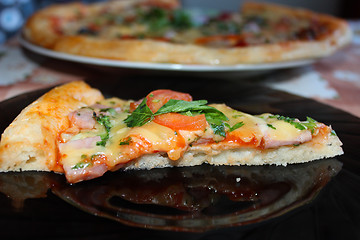 Image showing appetizing pieces of pizza