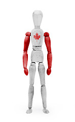 Image showing Wood figure mannequin with flag bodypaint - Canada