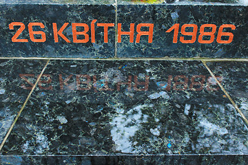 Image showing the date of Chernobyl catastrophe on the stone