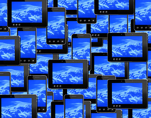 Image showing smart-phones and tablets with image of blue sky