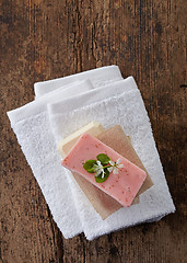 Image showing white towels and soap bar