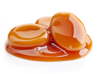 Image showing caramel candies and sweet sauce