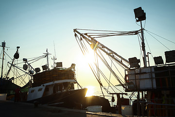 Image showing Ships moored at dock in Rovinj at sunset