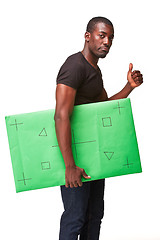 Image showing The smiling african man as black businessman with green panel