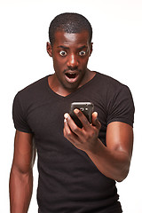 Image showing Portrait of african man talking on the phone