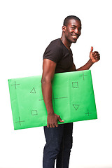 Image showing The smiling african man as black businessman with green panel