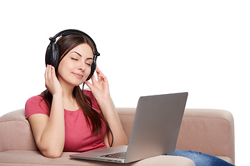 Image showing Woman in headphones enjoying music