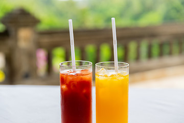 Image showing glasses of fresh fruit juice at restaurant