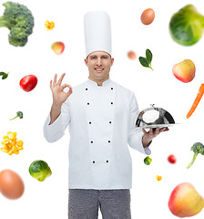 Image showing happy male chef cook with cloche showing ok sign