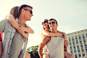 Image showing smiling couple having fun in city