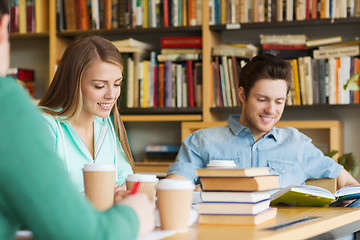 Image showing students reading and drinking coffee in library