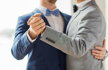 Image showing close up of happy male gay couple dancing