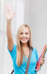 Image showing student with folders