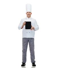 Image showing happy male chef cook showing with tablet pc