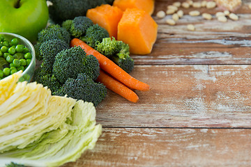 Image showing close up of ripe vegetables on wooden table