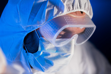 Image showing close up of scientist face in chemical lab