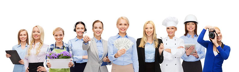 Image showing woman holding money over professional workers