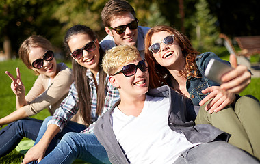 Image showing students or teenagers with smartphone at campus