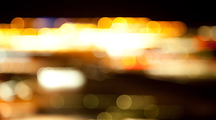 Image showing golden bright lights on dark night background