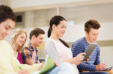 Image showing group of smiling students with tablet pc