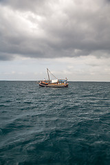 Image showing Tourists enjoying sea on yacht. Ship traveling in Kenya