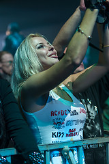 Image showing DNIPROPETROVSK, UKRAINE - OCTOBER 31: Young girl - a fan of Scorpions rock band.  live concert at Sports Palace SC \