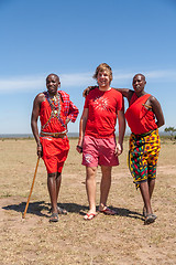 Image showing MASAI MARA,KENYA, AFRICA- FEB 12 Masai men in traditional clothes and European tourists