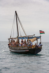 Image showing Tourists enjoying sea on yacht. Ship traveling in Kenya