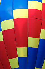 Image showing close up detail of hot air balloon of primary colors