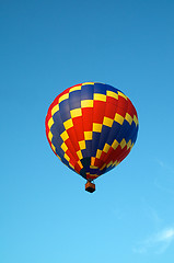 Image showing hot air balloon of primary colors flying in sky