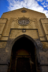 Image showing door and a cross in old church