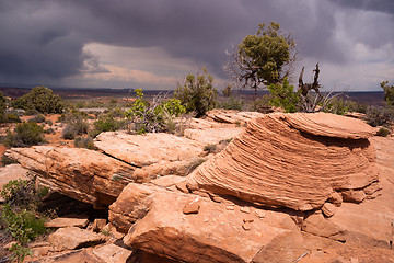 Image showing Rain Clouds Gather Over Rock Formations Utah Juniper Trees