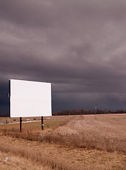 Image showing White Blank Billboard Advertising Sign Farm Field Thunder Storm