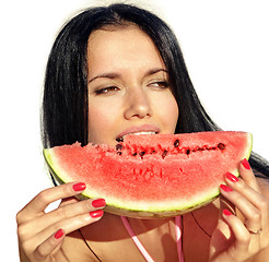 Image showing attractive girl eats watermelon