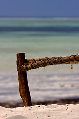 Image showing bench rope beach and sea in zanzibar coastline
