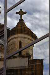 Image showing reflex of a church in a window