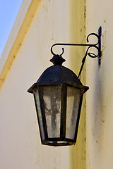 Image showing street lamp  and a yellow wall