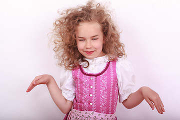 Image showing Small Bavarian girl in the dirndl in pose