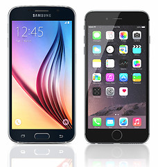 Image showing Black Sapphire Samsung Galaxy S6 and black Apple iPhone 6 on whi